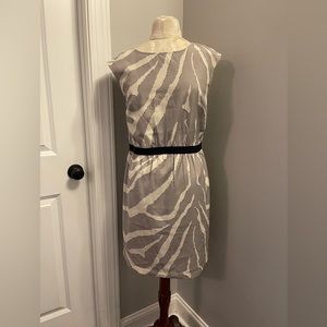 Loft Dres size Small. Smoke free. Small tear on top of back neckline.